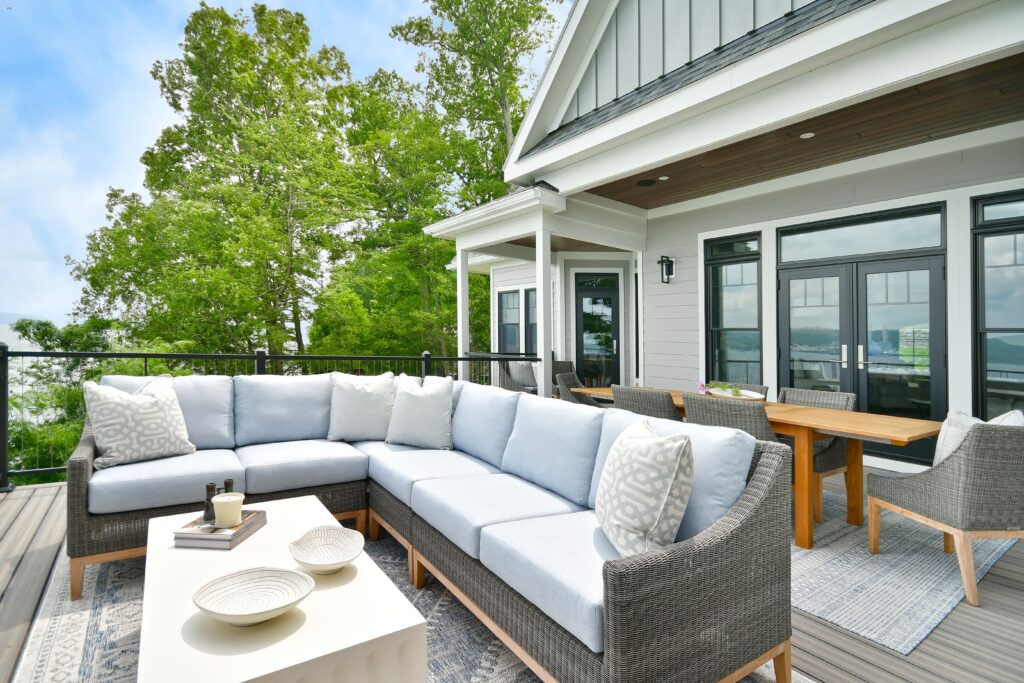 This deck offers dining and lounging areas without sacrificing the view of the lake beyond.