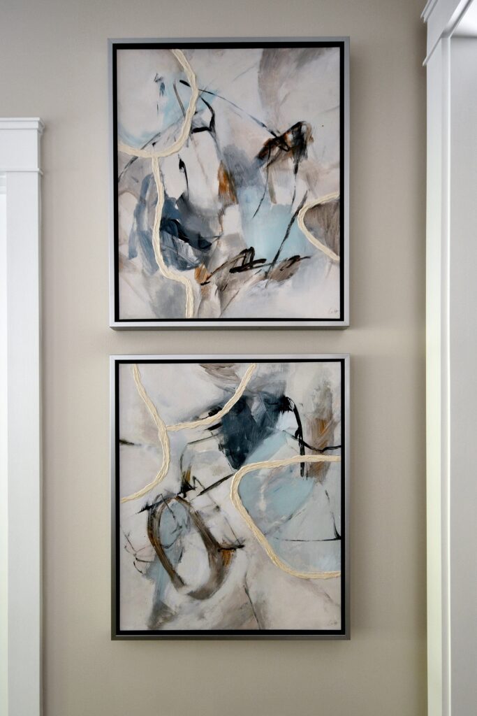 Part of the abstract series selected for the wall opposite the entry credenza